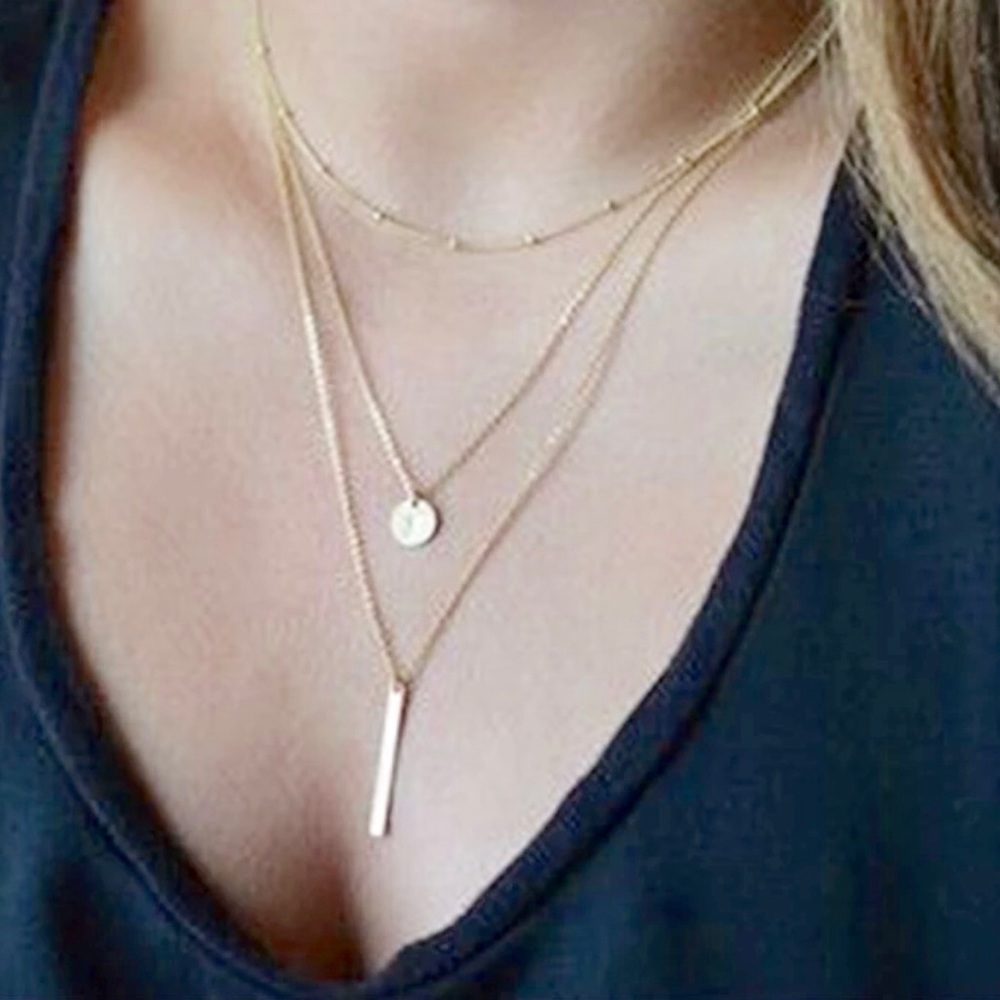 Dainty gold tone three layer necklace